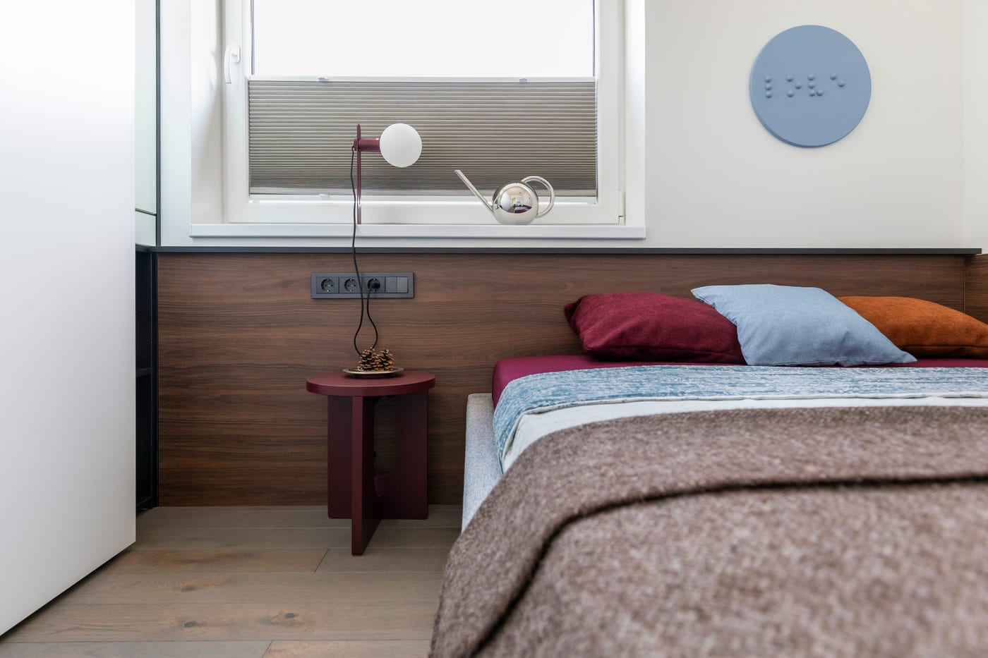 A leaning full-length mirror makes any small bedroom feel larger and brighter