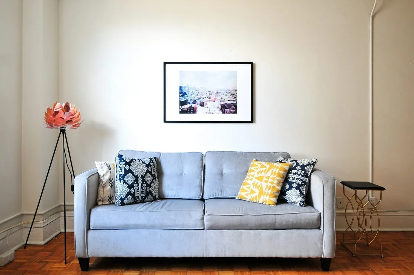 A multi-function sofa with clean proportions sized correctly for a small Canadian apartment living room