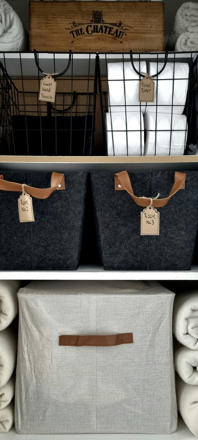 Flat IKEA SKUBB under-bed bags make full use of the largest untapped storage space in a small bedroom
