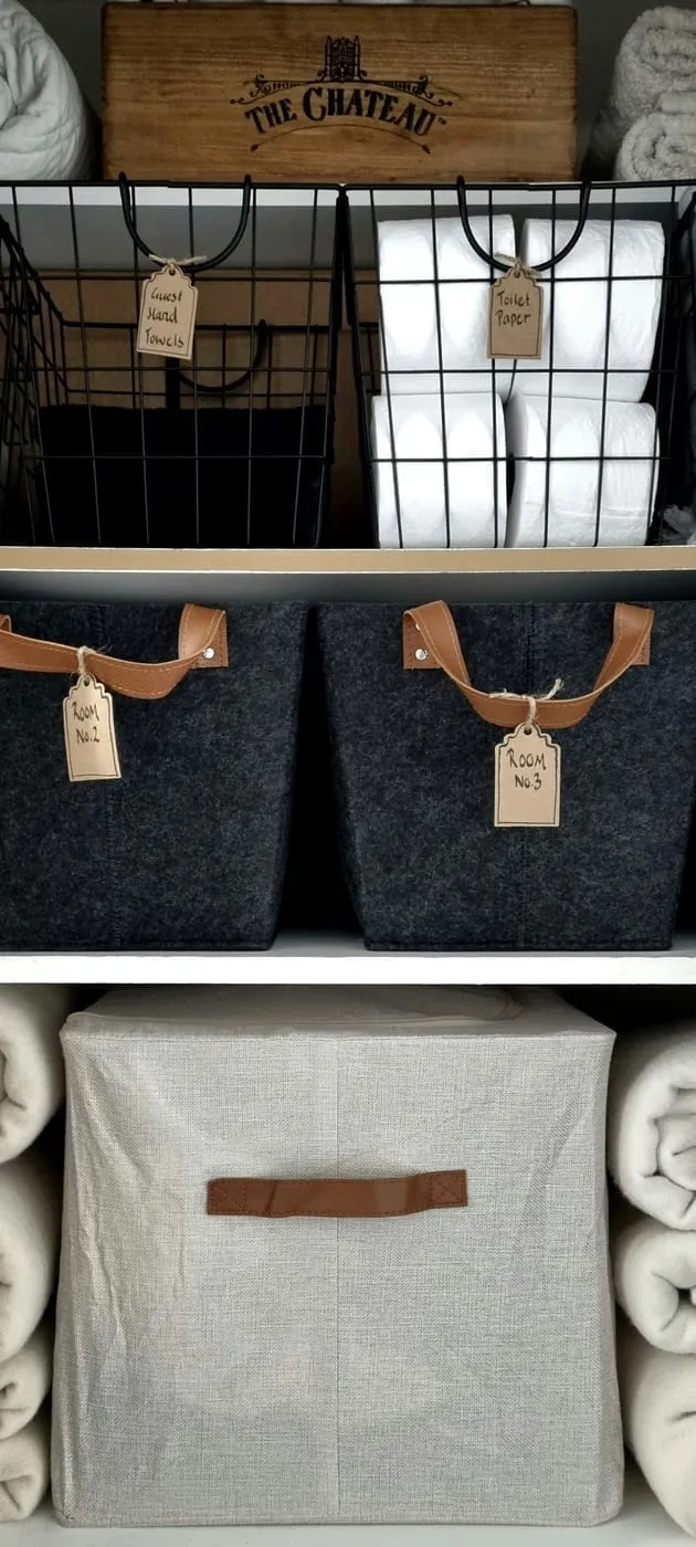 Flat IKEA SKUBB under-bed bags make full use of the largest untapped storage space in a small bedroom
