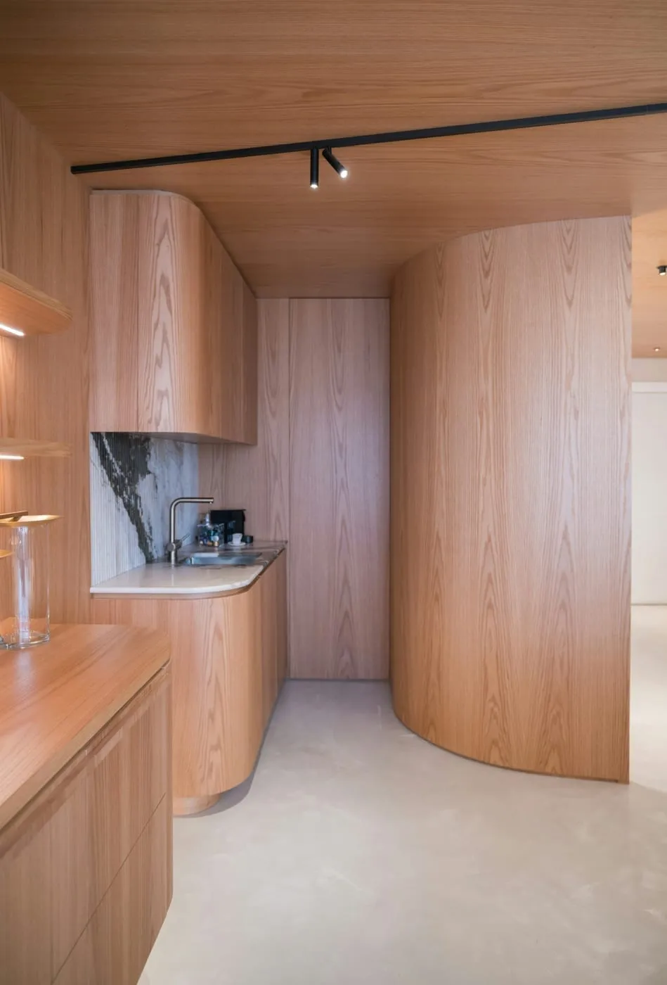 IKEA RASKOG rolling cart used as a kitchen island extension in a small apartment