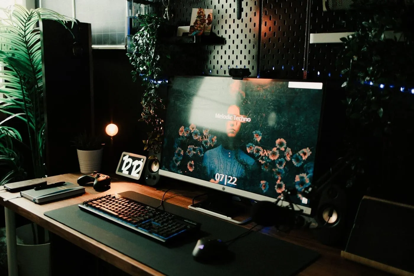 A small wall-mounted desk and organizer used as a paperwork command centre in a compact apartment entryway